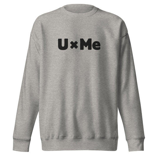 A grey crew neck sweatshirt with the text 'UxMe' embroidered in bold black letters across the chest