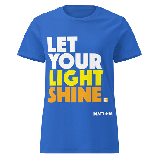 A royal blue short-sleeve t-shirt with a bold graphic print on the front reading 'LET YOUR LIGHT SHINE' in white, yellow, and orange text, with 'MATT 5:16' printed in white near the bottom right.