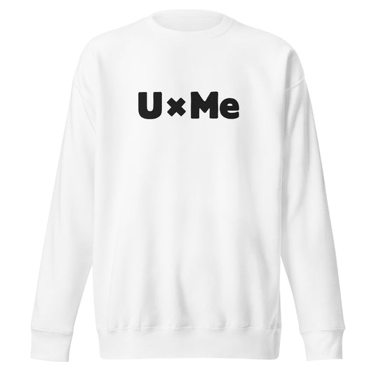 A white crew neck sweatshirt with the text 'UxMe' embroidered in bold black letters across the chest
